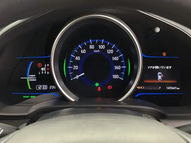 ホンダ フィット ハイブリット Fパッケージ 鹿児島県 2016(平28)年 14.8万km プレミアムホワイトパールⅡ 純正メモリナビ/(BT/CD/DVD/AM/FM/フルセグTV)/バックカメラ/ステアリングスイッチ/ETC/電動格納ミラー/純正フロアマット/純正ドアバイザー/パワーウィンドウ/パワーステアリング/保証書/取扱説明書