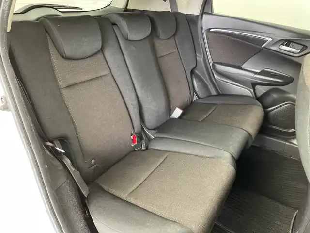 ホンダ フィット ハイブリット Fパッケージ 鹿児島県 2016(平28)年 14.8万km プレミアムホワイトパールⅡ 純正メモリナビ/(BT/CD/DVD/AM/FM/フルセグTV)/バックカメラ/ステアリングスイッチ/ETC/電動格納ミラー/純正フロアマット/純正ドアバイザー/パワーウィンドウ/パワーステアリング/保証書/取扱説明書