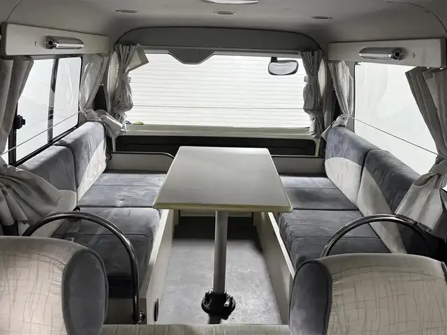 トヨタ ハイエース GL 佐賀県 2010(平22)年 4.5万km ホワイト ワンオーナー車/キャンピング仕様車/ベットキット/テーブル/家庭用テレビ/社外コンバーター/AC100V電源/カーテン/社外7インチナビ/フルセグテレビ/ETC/保証書/取扱説明書