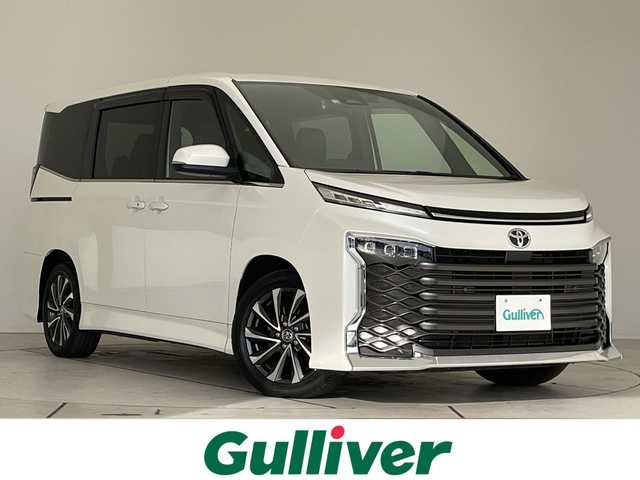 トヨタ ヴォクシー S－Z 愛知県 2022(令4)年 2.4万km ホワイトパールクリスタルシャイン 純正10.5型ディスプレイオーディオナビ/両側パワースライドドア/レーダークルーズコントロール/シートヒーター/バックカメラ/コーナーセンサー/純正アルミホイール/ETC2.0/LEDヘッドライト/インテリジェントミラー/リアオートエアコン/オートマチックハイビーム/ドライブレコーダー/衝突軽減システム/フルセグ/CD DVD/Bluetooth/ステアリングスイッチ/スマートキー/プッシュスタート