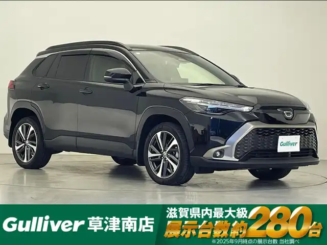 トヨタ カローラ クロス ハイブリッド Z 滋賀県 2023(令5)年 3.3万km アティチュードブラックマイカ 純正10インチディスプレイオーディオ/【Bluetooth/フルセグTV/USB】/ハーフレザーシート/全方位カメラ/追従クルーズコントロール/レーンキープアシスト/プリクラッシュセーフティ/クリアランスソナー/LEDヘッドライト/オートマチックハイビーム/パーキングアシスト/前後ドライブレコーダー/ビルトインETC2.0/D席パワーシート/D/Nシートヒーター/パワーバックドア/電動パーキングブレーキ/オートブレーキホールド/ステアリングヒーター/プッシュスタート/スマートキー/ステアリングリモコン/純正フロアマット