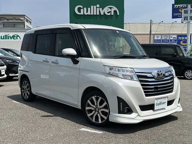 トヨタ ルーミー カスタムG－T 石川県 2018(平30)年 7万km パールホワイトⅢ 8インチ社外ナビ〔AVIC-CL901〕/　・フルセグTV/　・CD/DVD/　・Bluetooth接続/　・SDミュージックサーバー/　・AM/FMラジオ/バックカメラ/ETC/前席シートヒーター/両側パワースライドドア/LEDヘッドライト/プッシュスタート/スマートキー