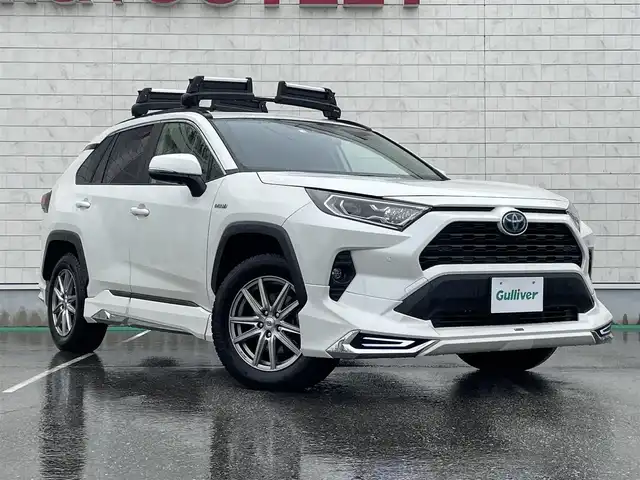 トヨタ ＲＡＶ４ ハイブリッドX 富山県 2020(令2)年 6.8万km ホワイトパールクリスタルシャイン モデリスタエアロ/サンルーフ/純正ナビ/フルセグTV/バックカメラ/横滑り防止装置/コーナーセンサー/レーンキープアシスト/盗難防止装置/BSM/衝突被害軽減システム/レーダークルーズコントロール/ドライブレコーダー/プッシュスタート/スマートキー/ETC/ルーフレール/オートライト/オートハイビーム/LEDヘッドライト/フォグランプ