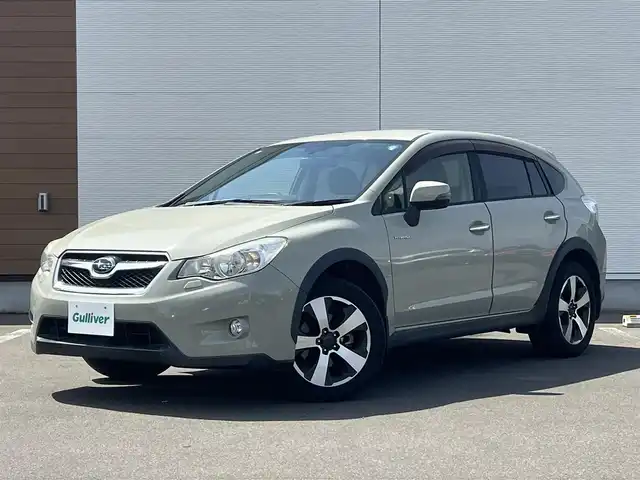 スバル インプレッサ ＸＶ ハイブリッド 2．0i－L アイサイト 秋田県 2014(平26)年 4.9万km デザートカーキ 社外ナビ/衝突軽減システム/ワンオーナー/LEDヘッドライト/４WD/純正アルミ/フルセグ/バックカメラ/スマートキー/前席パワーシート/前席シートヒーター/アイドリングストップ/レーンキープアシスト/クルーズコントロール/プッシュスタート/ETC/MTモード付AT/パドルシフト/ステアリングスイッチ/純正フロアマット/純正ドアバイザー/オートライト/オートエアコン/パワーステアリング/パワーウィンドウ/電動格納ウィンカーミラー/横滑り防止/保証書/取扱説明書/記録簿