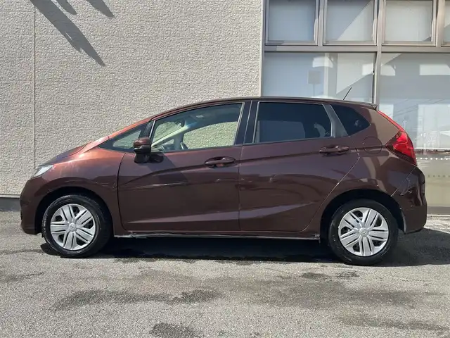 ホンダ フィット 13G L ホンダセンシング 大阪府 2018(平30)年 4万km プレミアムアガットブラウンP 純正ナビ(フルセグ)/純正AW/純正フロアマット/Bluetooth/ビルトインETC/エンジンスタートボタン/衝突被害軽減システム/横滑り防止装置/レーンキープアシスト/オートライト/ドライブレコーダー/Wエアバッグ/取扱説明書/保証書/ワンオーナー