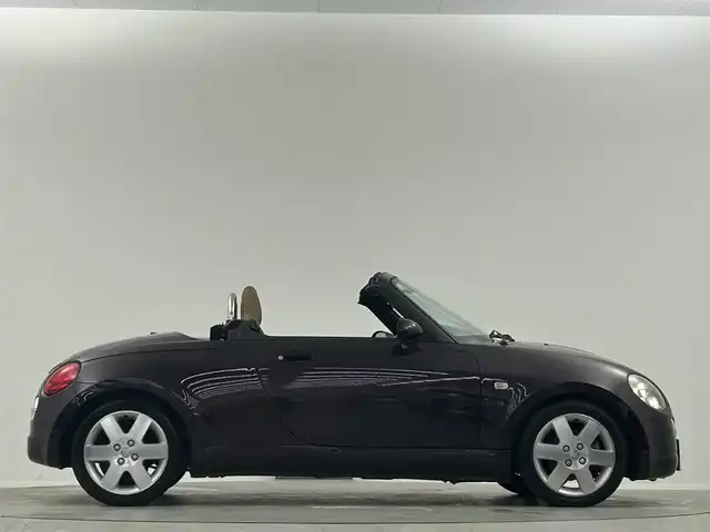 ダイハツ コペン タンレザーエディション 埼玉県 2009(平21)年 4.9万km ダークレッドマイカ レザーシート　シートヒーター　社外カロッツェリアナビ　Ｂｌｕｅｔｏｏｔｈ　ワンセグＴＶ　社外マフラー　キセノン　フォグランプ　キーレス　純正１５ＡＷ　ＥＴＣ　純正ＭＯＭＯステアリング　電動オープン/純正マフラー　車載/アクティブトップ　動作確認済み