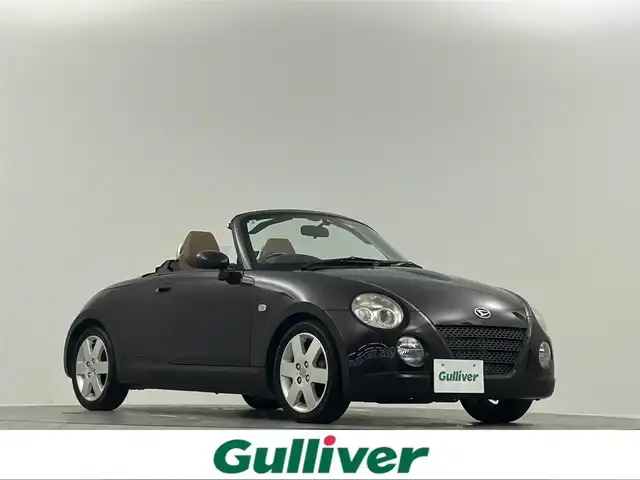 ダイハツ コペン タンレザーエディション 埼玉県 2009(平21)年 4.9万km ダークレッドマイカ レザーシート　シートヒーター　社外カロッツェリアナビ　Ｂｌｕｅｔｏｏｔｈ　ワンセグＴＶ　社外マフラー　キセノン　フォグランプ　キーレス　純正１５ＡＷ　ＥＴＣ　純正ＭＯＭＯステアリング　電動オープン/純正マフラー　車載/アクティブトップ　動作確認済み