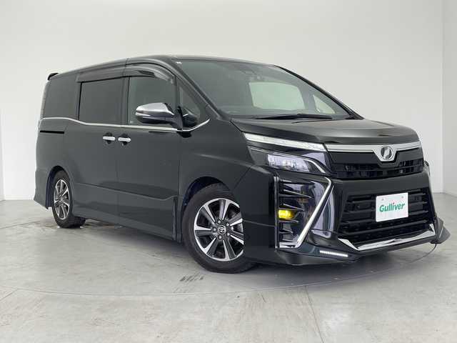 トヨタ ヴォクシー ZS 煌Ⅱ 愛知県 2019(平31)年 6.7万km ブラック SDナビ/・フルセグ/・Bluetooth/・DVD/・CD/TDRエアロ/フリップダウンモニター/ETC/バックカメラ/前後ドライブレコーダー/両側パワースライドドア/ABS/横滑り防止装置/前後コーナーセンサー/レーンキープアシスト/イモビライザー/衝突軽減ブレーキ/オートライト/オートハイビーム/LEDヘッドライト/シートカバー/純正アルミホイール