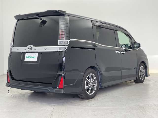 トヨタ ヴォクシー ZS 煌Ⅱ 愛知県 2019(平31)年 6.7万km ブラック SDナビ/・フルセグ/・Bluetooth/・DVD/・CD/TDRエアロ/フリップダウンモニター/ETC/バックカメラ/前後ドライブレコーダー/両側パワースライドドア/ABS/横滑り防止装置/前後コーナーセンサー/レーンキープアシスト/イモビライザー/衝突軽減ブレーキ/オートライト/オートハイビーム/LEDヘッドライト/シートカバー/純正アルミホイール