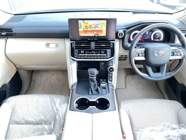 トヨタ ランドクルーザー ZX 道央・札幌 2025(令7)年 0.1千km プレシャスホワイトパール ・4WD  /2025年改良モデル/寒冷地仕様/・純正12.3インチディスプレイオーディオ /・ ナビ/DTV/HDMI/BT/・電動ムーンルーフ/・リアシートエンターテイメントシステム/・JBLサウンドシステム/・ヘッドアップディスプレイ/・モデリスタエアロ/・パノラミックビューモニター/・ベージュレザーシート/・前席2列目シートヒーター/エアシート/・前席パワーシート(D席3メモリー付)/・電動格納サードシート/・パワーバックドア/・ルーフレール/・Toyota Safety Sense/・アダプティブハイビームシステム/・オートマチックハイビーム/・プリクラッシュセーフティ/・レーントレーシングアシスト/・レーンデパーチャーアラート/・発信遅れ告知機能/ロードサインアシスト/・レーダークルーズコントロール/・ブラインドスポットモニター/・クリアランスソナー/・パーキングサポートブレーキ/・純正20インチAW/・純正LEDヘッドライト/・ターンランプ付電動格納ドアミラー/・純正フロアマット/・取扱説明書/マルチメディア取扱説明書/・新車時保証書有