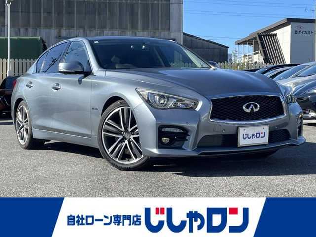 日産 スカイライン ハイブリッド 350GT Type SP 愛知県 2014(平26)年 11.4万km ハガネブルーM (株)IDOMが運営する【じしゃロン名古屋鳴海店】の自社ローン専用車両になります。/こちらは現金またはオートローンご利用の価格です。/自社ローンご希望の方は別途その旨お申し付けください。/純正メモリナビ(AM、FM、フルセグTV、BT、USB）/黒レザーシート/前席シートヒーター/ステアリングスイッチ/クルーズコントロール/パドルシフト/走行支援/シートメモリD席/前席パワーシート/前後コーナーセンサー/電動リアゲート/レーンキープアシスト/純正フロアマット/ドアバイザー/LEDヘッドライト/ETC