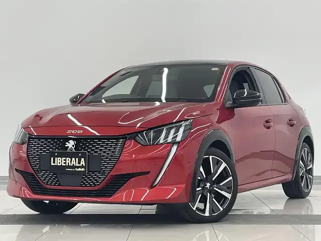 プジョー ２０８ GT ライン 岡山県 2020(令2)年 1.6万km 赤 ワンオーナー　/パノラマガラスルーフ/アンビエントライト　　/純正ナビ　/アップルカープレイ　/アンドロイドオート　/Ｂカメラ　/ＤＴＶ　/インテリジェントハイビーム　/ワイヤレスチャージ/パーキングセンサー/LKA/BSM/ACC