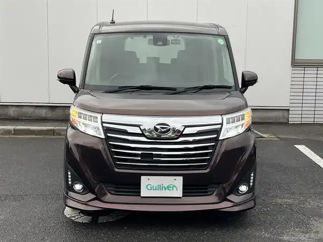 ダイハツ トール カスタムG ターボ SAⅡ 三重県 2017(平29)年 7.3万km プラムブラウンクリスタルマイカ パノラマモニター/ドライブレコーダー（前）/アルパイン9インチナビ（Bluetooth/地デジTV/DVD/CD/SD/AM/FM）/スマートアシスト2（衝突回避支援ブレーキ/対車両・歩行者衝突警報/車線逸脱警報/誤発進抑制制御/先行車発進お知らせ）/コンフォートパック（前席シートヒーター/シートバックテーブル）/パワースライドドア（運転席側/助手席側）/LEDヘッドランプ/オートライト/LEDフロントフォグランプ/イルミネーションランプ/ステアリングスイッチ（カラーマルチインフォメーションディスプレイ/スポーツモード/オーディオ）/撥水機能付ブラックファブリックシート/シートリフター（運転席）/シートアンダートレイ（助手席）/シートバックポケット（助手席）/スペアキー