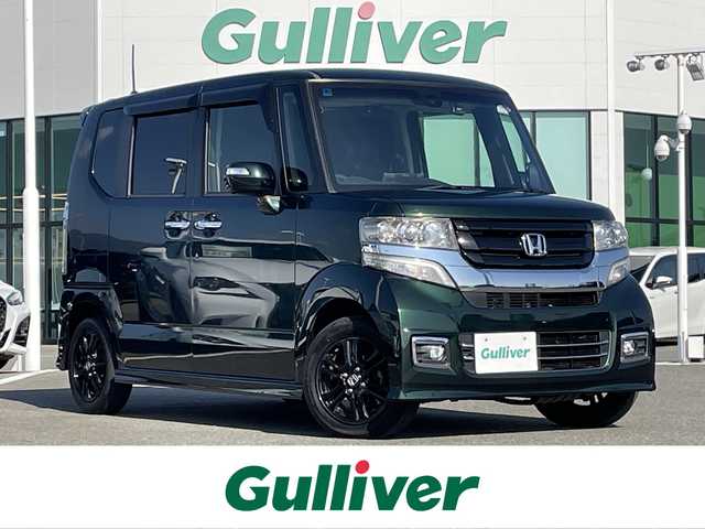 ホンダ Ｎ ＢＯＸ カスタム SSブラックSパッケージ 佐賀県 2017(平29)年 4.5万km ブリティッシュグリーンP 社外10インチSDナビゲーション/・フルセグTV/CD/DVD/SD/Bluetooth/バックカメラ/前方ドライブレコーダー/ビルトインETC/両側パワースライドドア/オーバーヘッドコンソール/レザー調シートカバー/DN席シートヒーター/ISOFIX対応/ステアリングリモコン/純正14インチアルミホイール/純正キセノンヘッドライト/純正LEDフォグランプ/純正フロアマット/純正ドアバイザ―/新車保証書/取扱説明書/シティブレーキアクティブシステム/横滑り防止装置