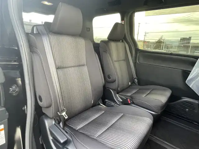 トヨタ ヴォクシー ZS 煌 福岡県 2018(平30)年 4.8万km ブラック 純正10型SDナビ(フルセグTV/CD/DVD/BT)/バックカメラ/トヨタセーフティ/コーナーセンサー/後席フリップダウンモニター/両側電動/ドラレコ/クルコン/ETC/USB/HDMI/純正フロアマット/純正LED/純正アルミホイール/プッシュスタート/スマートキー