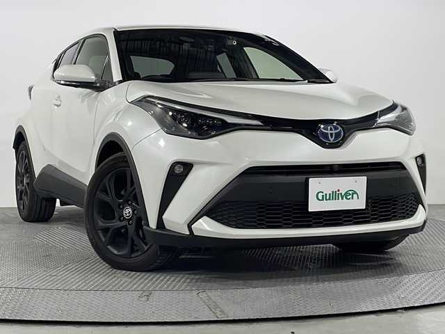 トヨタ Ｃ－ＨＲ G モード ネロセーフティプラスⅡ 広島県 2021(令3)年 1.4万km ホワイトパールクリスタルシャイン 純正8型ディスプレイオーディオ/・Bluetooth/・スマートフォン連携/パノラミックビューモニター/セーフティセンス/ブラインドスポットモニター/シートヒーター/コーナーセンサー/ETC/ドラレコ/ハーフレザーシート/LEDヘッドライト