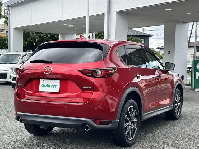 マツダ ＣＸ－５ XD Lパッケージ 熊本県 2017(平29)年 9.5万km ソウルレッドクリスタルM メーカーナビ/【フルセグTV/Bluetooth/CD/DVD/USB】/バックモニター/サイドモニター（左側）/レーダークルーズコントロール/衝突軽減防止装置/ブラインドスポットモニター/レーンキープアシスト/ヘッドアップディスプレイ/ブレーキホールド/パワーバックドア/パワーシート（D席N席）/シートヒーター/ステアリングヒーター/ステアリングスイッチ/社外ドラレコ/ETC/オートライトLED/オートマチックハイビーム/純正19インチアルミホイール/革巻きステアリング/本革シート/純正フロアマット/プッシュスタート/スマートキー/TCF/盗難防止装置/保証書/取扱説明書/スペアキー