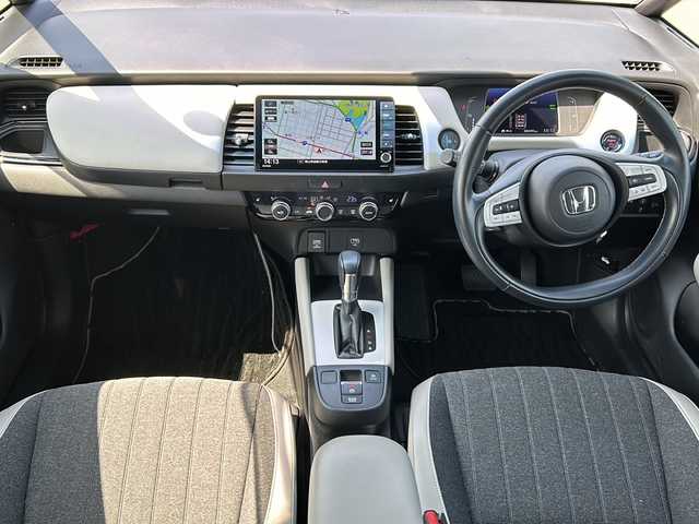 ホンダ フィット e:HEVホーム 岡山県 2021(令3)年 3.4万km プラチナホワイトパール 純正ナビＶＸＵ－２１５ＦＴｉ　ＢＴ／ＣＤ／ＤＶＤ／フルセグ　バックカメラ　純正１６インチＡＷ　追従クルコン　シートヒーター　前後コーナーセンサー　前後ドラレコ　横滑り防止　スマートキー　ＬＥＤ