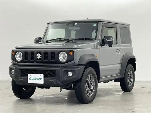 スズキ ジムニー シエラ JC 群馬県 2023(令5)年 1.5万km ミディアムグレー パナソニック製フローティングメモリナビ【型番　CN-F1D9GD】/　・9インチHD液晶ディスプレイ/　・FM/AM/CD/DVD/Bluetooth/フルセグ/前後ドライブレコーダー【型番　CA-DR03HTD】/バックカメラ/デュアルセンサーブレーキサポート/レーンキープアシスト/クルーズコントロール/ダウンヒルアシストコントロール/ビルトインETC/前席シートヒーター/純正15インチアルミホイール/純正フロアマット/スマートキー/プッシュスタート