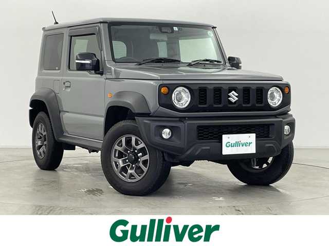 スズキ ジムニー シエラ JC 群馬県 2023(令5)年 1.5万km ミディアムグレー パナソニック製フローティングメモリナビ【型番　CN-F1D9GD】/　・9インチHD液晶ディスプレイ/　・FM/AM/CD/DVD/Bluetooth/フルセグ/前後ドライブレコーダー【型番　CA-DR03HTD】/バックカメラ/デュアルセンサーブレーキサポート/レーンキープアシスト/クルーズコントロール/ダウンヒルアシストコントロール/ビルトインETC/前席シートヒーター/純正15インチアルミホイール/純正フロアマット/スマートキー/プッシュスタート