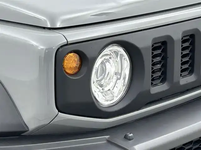 スズキ ジムニー シエラ JC 群馬県 2023(令5)年 1.5万km ミディアムグレー 社外７インチナビ　バックカメラ　衝突軽減ブレーキ　車線逸脱警報　クルーズコントロール　オートハイビーム　ダウンヒルアシストコントロール　シートヒーター　ステアリングスイッチ　ＬＥＤヘッドライト　禁煙車