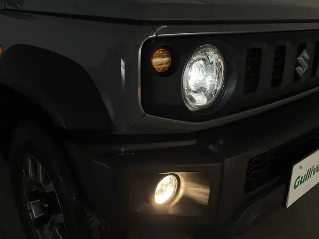 スズキ ジムニー シエラ JC 群馬県 2023(令5)年 1.5万km ミディアムグレー パナソニック製フローティングメモリナビ【型番　CN-F1D9GD】/　・9インチHD液晶ディスプレイ/　・FM/AM/CD/DVD/Bluetooth/フルセグ/前後ドライブレコーダー【型番　CA-DR03HTD】/バックカメラ/デュアルセンサーブレーキサポート/レーンキープアシスト/クルーズコントロール/ダウンヒルアシストコントロール/ビルトインETC/前席シートヒーター/純正15インチアルミホイール/純正フロアマット/スマートキー/プッシュスタート