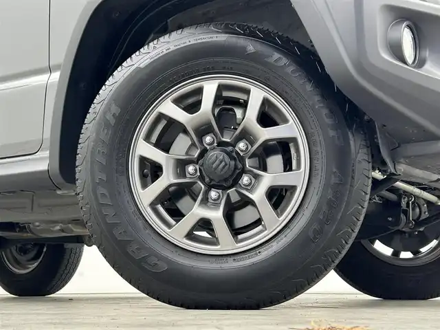 スズキ ジムニー シエラ JC 群馬県 2023(令5)年 1.5万km ミディアムグレー 社外７インチナビ　バックカメラ　衝突軽減ブレーキ　車線逸脱警報　クルーズコントロール　オートハイビーム　ダウンヒルアシストコントロール　シートヒーター　ステアリングスイッチ　ＬＥＤヘッドライト　禁煙車