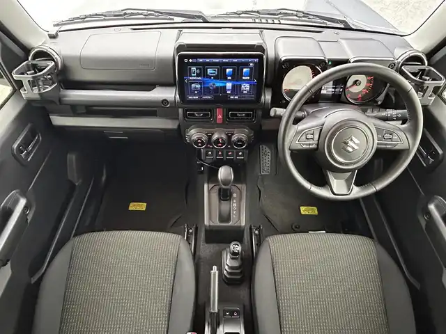 スズキ ジムニー シエラ JC 群馬県 2023(令5)年 1.5万km ミディアムグレー 社外７インチナビ　バックカメラ　衝突軽減ブレーキ　車線逸脱警報　クルーズコントロール　オートハイビーム　ダウンヒルアシストコントロール　シートヒーター　ステアリングスイッチ　ＬＥＤヘッドライト　禁煙車