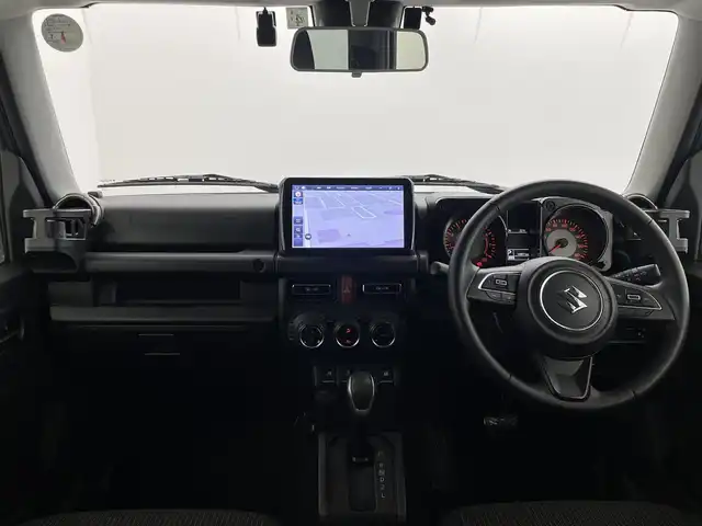 スズキ ジムニー シエラ JC 群馬県 2023(令5)年 1.5万km ミディアムグレー パナソニック製フローティングメモリナビ【型番　CN-F1D9GD】/　・9インチHD液晶ディスプレイ/　・FM/AM/CD/DVD/Bluetooth/フルセグ/前後ドライブレコーダー【型番　CA-DR03HTD】/バックカメラ/デュアルセンサーブレーキサポート/レーンキープアシスト/クルーズコントロール/ダウンヒルアシストコントロール/ビルトインETC/前席シートヒーター/純正15インチアルミホイール/純正フロアマット/スマートキー/プッシュスタート