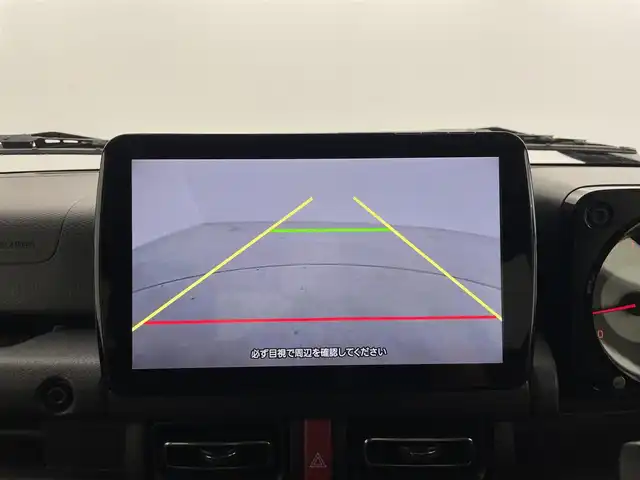 スズキ ジムニー シエラ JC 群馬県 2023(令5)年 1.5万km ミディアムグレー パナソニック製フローティングメモリナビ【型番　CN-F1D9GD】/　・9インチHD液晶ディスプレイ/　・FM/AM/CD/DVD/Bluetooth/フルセグ/前後ドライブレコーダー【型番　CA-DR03HTD】/バックカメラ/デュアルセンサーブレーキサポート/レーンキープアシスト/クルーズコントロール/ダウンヒルアシストコントロール/ビルトインETC/前席シートヒーター/純正15インチアルミホイール/純正フロアマット/スマートキー/プッシュスタート