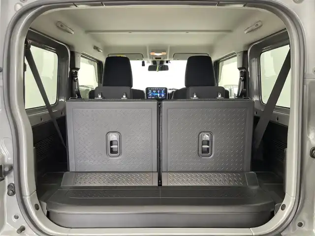 スズキ ジムニー シエラ JC 群馬県 2023(令5)年 1.5万km ミディアムグレー パナソニック製フローティングメモリナビ【型番　CN-F1D9GD】/　・9インチHD液晶ディスプレイ/　・FM/AM/CD/DVD/Bluetooth/フルセグ/前後ドライブレコーダー【型番　CA-DR03HTD】/バックカメラ/デュアルセンサーブレーキサポート/レーンキープアシスト/クルーズコントロール/ダウンヒルアシストコントロール/ビルトインETC/前席シートヒーター/純正15インチアルミホイール/純正フロアマット/スマートキー/プッシュスタート