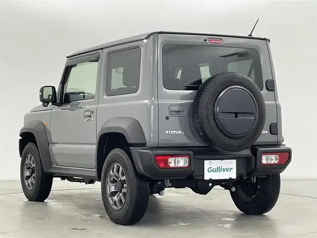 スズキ ジムニー シエラ JC 群馬県 2023(令5)年 1.5万km ミディアムグレー パナソニック製フローティングメモリナビ【型番　CN-F1D9GD】/　・9インチHD液晶ディスプレイ/　・FM/AM/CD/DVD/Bluetooth/フルセグ/前後ドライブレコーダー【型番　CA-DR03HTD】/バックカメラ/デュアルセンサーブレーキサポート/レーンキープアシスト/クルーズコントロール/ダウンヒルアシストコントロール/ビルトインETC/前席シートヒーター/純正15インチアルミホイール/純正フロアマット/スマートキー/プッシュスタート
