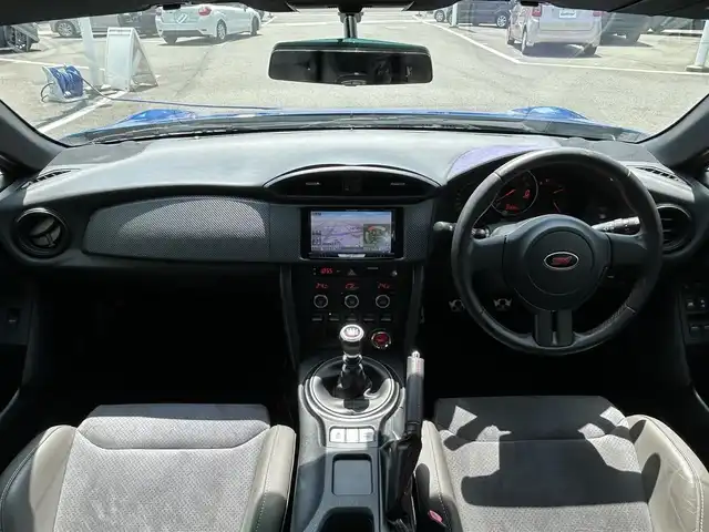 スバル ＢＲＺ tS GTパッケージ 愛媛県 2013(平25)年 2.6万km WRブルーマイカ 禁煙車/登録時走行距離：25832km/ディーラーオプション純正7インチナビ(反応不良)/CD/DVD/フルセグTV/Bluetooth/バックカメラ/ETC/横滑り防止装置/HIDヘッドライト/フォグランプ/オートライト/ハーフレザーシート/エンジンスタートボタン/スマートキー/純正フロアマット/純正18インチアルミホイール/純正エアロ