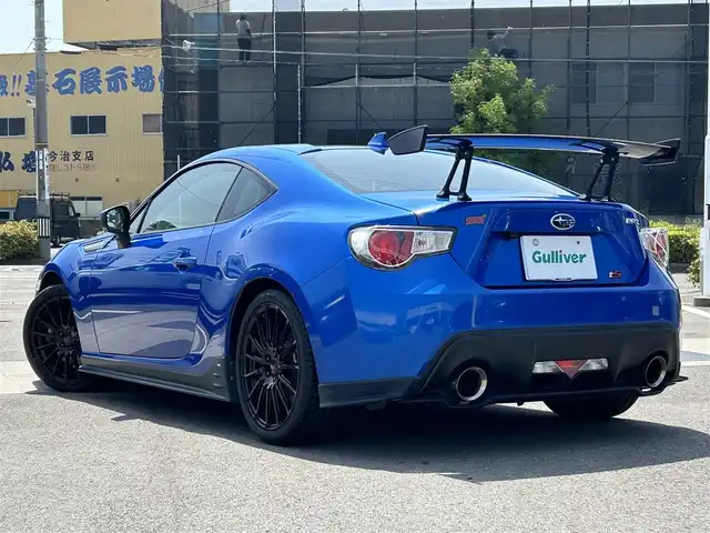 スバル ＢＲＺ tS GTパッケージ 愛媛県 2013(平25)年 2.6万km WRブルーマイカ 禁煙車/登録時走行距離：25832km/ディーラーオプション純正7インチナビ(反応不良)/CD/DVD/フルセグTV/Bluetooth/バックカメラ/ETC/横滑り防止装置/HIDヘッドライト/フォグランプ/オートライト/ハーフレザーシート/エンジンスタートボタン/スマートキー/純正フロアマット/純正18インチアルミホイール/純正エアロ