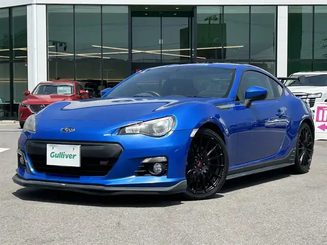 スバル ＢＲＺ tS GTパッケージ 愛媛県 2013(平25)年 2.6万km WRブルーマイカ 禁煙車/登録時走行距離：25832km/ディーラーオプション純正7インチナビ(反応不良)/CD/DVD/フルセグTV/Bluetooth/バックカメラ/ETC/横滑り防止装置/HIDヘッドライト/フォグランプ/オートライト/ハーフレザーシート/エンジンスタートボタン/スマートキー/純正フロアマット/純正18インチアルミホイール/純正エアロ