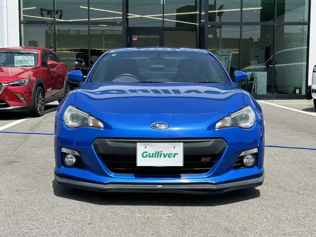 スバル ＢＲＺ tS GTパッケージ 愛媛県 2013(平25)年 2.6万km WRブルーマイカ 禁煙車/登録時走行距離：25832km/ディーラーオプション純正7インチナビ(反応不良)/CD/DVD/フルセグTV/Bluetooth/バックカメラ/ETC/横滑り防止装置/HIDヘッドライト/フォグランプ/オートライト/ハーフレザーシート/エンジンスタートボタン/スマートキー/純正フロアマット/純正18インチアルミホイール/純正エアロ