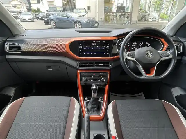 フォルクスワーゲン Ｔ－クロス TSI 1stプラス 和歌山県 2020(令2)年 3.1万km ガンＭ ワンオーナー/純正ナビ/　＜CD/DVD/SD/Bluetooth/AM/FM＞/バックカメラ/ETC2.0/ACC/レーンアシスト/ブラインドスポットモニター/コーナーセンサー/パーキングアシスト/前後ドラレコ/革巻きステアリング/ルーフレール/電動格納ミラー/純正フロアマット/オートライト/スマートキー×２/取扱説明書/保証書
