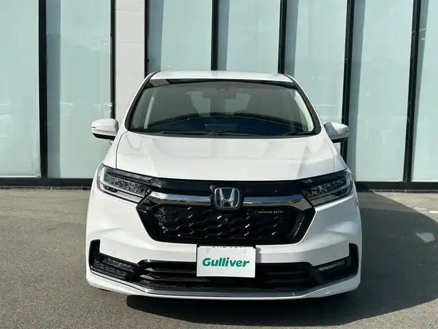 ホンダ オデッセイ アブソルート EX 大阪府 2021(令3)年 2.1万km プラチナホワイトパール 純正１０インチナビ/   フルセグTV/CD/DVD/Bluetooth/USB/全方位モニター/１１．６インチ後席モニター/衝突軽減ブレーキ/横滑り防止装置/コーナーセンサー/ＢＳＭ/前席シートヒーター/前席パワーシート/電動リアゲート/両側パワースライドドア/レーダークルーズコントロール/レーンキープアシスト/パドルシフト/アイドリングストップ/前後ドライブレコーダー/VELVA SPORT 17インチアルミホイール/純正フロアマット/オットマン/プッシュスタート/スマートキー/ＥＴＣ/ＬＥＤ/禁煙車