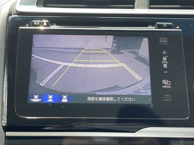 ホンダ フィット ハイブリット Sパッケージ 静岡県 2014(平26)年 4.3万km ティンテッドシルバーM ワンオーナー/プッシュスタート/スマートキー/純正ナビ/　フルセグTV/BTオーディオ/DVD/バックカメラ /クルーズコントロール/純正16インチAW/パドルシフト/オートライト/LEDヘッドライト/カーテンエアバック