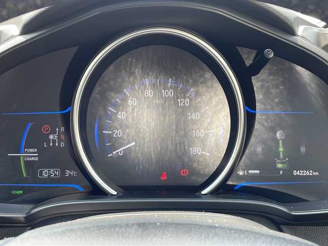 ホンダ フィット ハイブリット Sパッケージ 静岡県 2014(平26)年 4.3万km ティンテッドシルバーM ワンオーナー/プッシュスタート/スマートキー/純正ナビ/　フルセグTV/BTオーディオ/DVD/バックカメラ /クルーズコントロール/純正16インチAW/パドルシフト/オートライト/LEDヘッドライト/カーテンエアバック