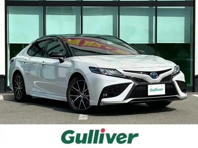 トヨタ カムリ WSレザーパッケージ 和歌山県 2021(令3)年 7万km アティチュードブラックマイカ/プラチナホワイトパールマイカ 純正ナビ/フルセグTV/Bluetooth/CD/DVD/USB/バックカメラ/ビルトインETC/前後ドライブレコーダー/トヨタセーフティセンス/BSM/レーダークルーズコントロール/レーンキープアシスト/クリアランスソナー/革巻きステアリング/ステアリングスイッチ/パドルシフト/レザーシート/前席パワーシート/前席シートヒーター/LEDヘッドライト/オートライト/オートハイビーム/純正18インチAW/ドアバイザー/純正フロアマット/プッシュスタート/スマートキー
