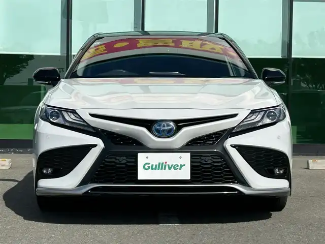 トヨタ カムリ WSレザーパッケージ 和歌山県 2021(令3)年 7万km アティチュードブラックマイカ/プラチナホワイトパールマイカ 純正ナビ/フルセグTV/Bluetooth/CD/DVD/USB/バックカメラ/ビルトインETC/前後ドライブレコーダー/トヨタセーフティセンス/BSM/レーダークルーズコントロール/レーンキープアシスト/クリアランスソナー/革巻きステアリング/ステアリングスイッチ/パドルシフト/レザーシート/前席パワーシート/前席シートヒーター/LEDヘッドライト/オートライト/オートハイビーム/純正18インチAW/ドアバイザー/純正フロアマット/プッシュスタート/スマートキー