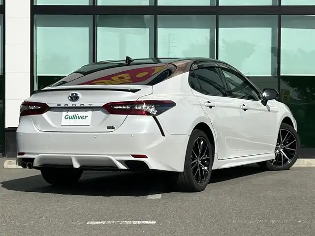 トヨタ カムリ WSレザーパッケージ 和歌山県 2021(令3)年 7万km アティチュードブラックマイカ/プラチナホワイトパールマイカ 純正ナビ/フルセグTV/Bluetooth/CD/DVD/USB/バックカメラ/ビルトインETC/前後ドライブレコーダー/トヨタセーフティセンス/BSM/レーダークルーズコントロール/レーンキープアシスト/クリアランスソナー/革巻きステアリング/ステアリングスイッチ/パドルシフト/レザーシート/前席パワーシート/前席シートヒーター/LEDヘッドライト/オートライト/オートハイビーム/純正18インチAW/ドアバイザー/純正フロアマット/プッシュスタート/スマートキー