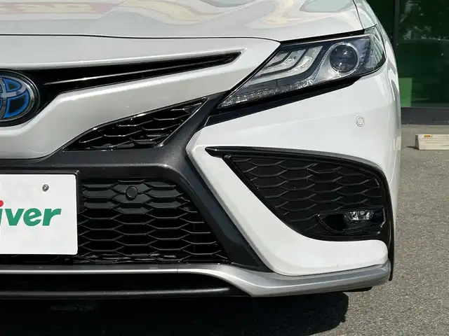 トヨタ カムリ WSレザーパッケージ 和歌山県 2021(令3)年 7万km アティチュードブラックマイカ/プラチナホワイトパールマイカ 純正ナビ/フルセグTV/Bluetooth/CD/DVD/USB/バックカメラ/ビルトインETC/前後ドライブレコーダー/トヨタセーフティセンス/BSM/レーダークルーズコントロール/レーンキープアシスト/クリアランスソナー/革巻きステアリング/ステアリングスイッチ/パドルシフト/レザーシート/前席パワーシート/前席シートヒーター/LEDヘッドライト/オートライト/オートハイビーム/純正18インチAW/ドアバイザー/純正フロアマット/プッシュスタート/スマートキー