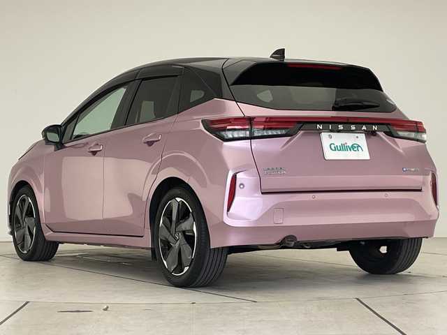 日産 オーラ G 愛知県 2022(令4)年 5万km ピンク プロパイロット/純正9型ディスプレイオーディオナビ/プレミアムサウンドBOSE/全方位カメラ/レーダークルーズコントロール/シートヒーター/バックカメラ/コーナーセンサー/純正アルミホイール/ETC2.0/ブラインドスポットモニター/LEDヘッドライト/ステアリングヒーター/インテリジェントミラー/オートマチックハイビーム/ワイヤレス充電機/衝突軽減システム/フルセグ/Bluetooth/ステアリングスイッチ/スマートキー/プッシュスタート