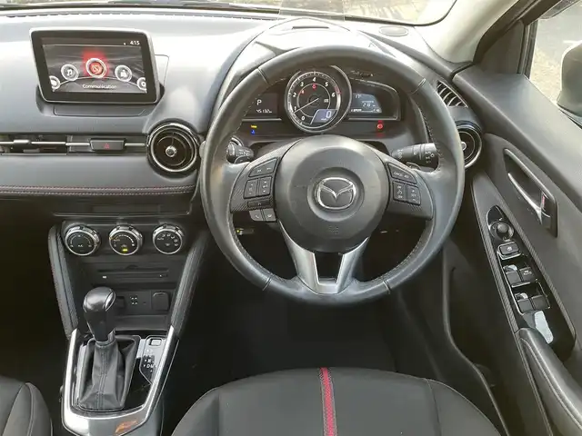 マツダ デミオ XD ツーリング 鳥取県 2015(平27)年 4.6万km スノーフレイクホワイトパールマイカ ディーゼル・ターボ/純正ナビ／フルセグ／ＤＶＤ／ＣＤ／ＢＴ/ＥＴＣ・ドライブレコーダー/衝突軽減ブレーキ/クルーズコントロール/パドルシフト/ＬＥＤヘットライト/フォグライト/ヘットアップディスプレイ/社外サスペンション（減衰調整付き）/社外１７インチアルミホイール/プッシュエンジンスタート/オートライト/フロアマット/ドアバイザー