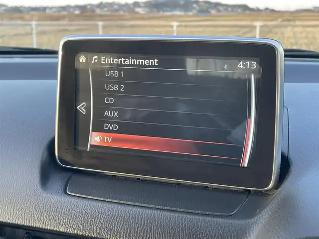 マツダ デミオ XD ツーリング 鳥取県 2015(平27)年 4.6万km スノーフレイクホワイトパールマイカ ディーゼル・ターボ/純正ナビ／フルセグ／ＤＶＤ／ＣＤ／ＢＴ/ＥＴＣ・ドライブレコーダー/衝突軽減ブレーキ/クルーズコントロール/パドルシフト/ＬＥＤヘットライト/フォグライト/ヘットアップディスプレイ/社外サスペンション（減衰調整付き）/社外１７インチアルミホイール/プッシュエンジンスタート/オートライト/フロアマット/ドアバイザー