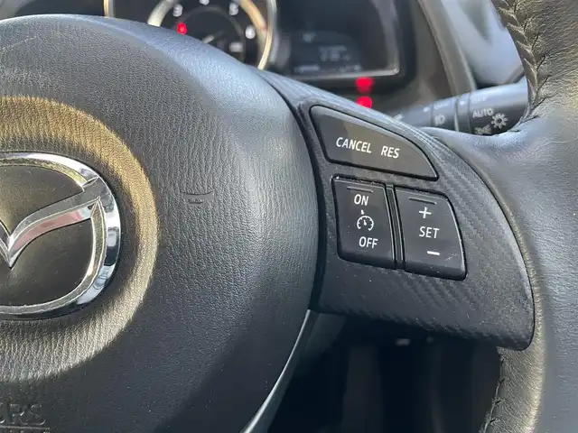 マツダ デミオ XD ツーリング 鳥取県 2015(平27)年 4.6万km スノーフレイクホワイトパールマイカ ディーゼル・ターボ/純正ナビ／フルセグ／ＤＶＤ／ＣＤ／ＢＴ/ＥＴＣ・ドライブレコーダー/衝突軽減ブレーキ/クルーズコントロール/パドルシフト/ＬＥＤヘットライト/フォグライト/ヘットアップディスプレイ/社外サスペンション（減衰調整付き）/社外１７インチアルミホイール/プッシュエンジンスタート/オートライト/フロアマット/ドアバイザー