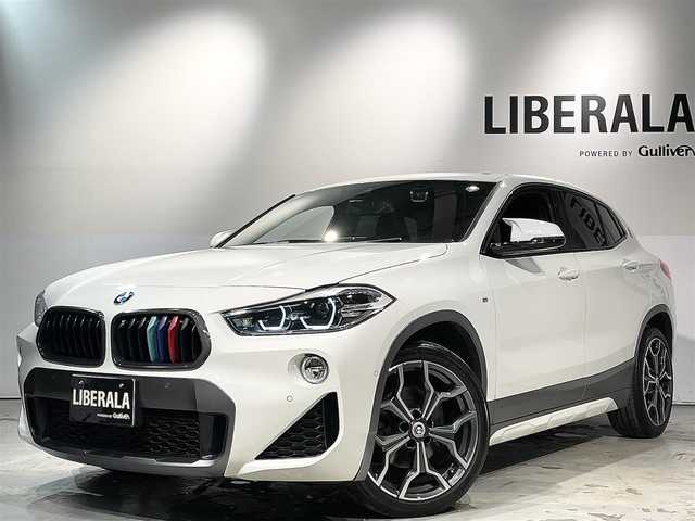 ＢＭＷ Ｘ２ xDrive 18d MスポーツX EDジョイ+ 道央・札幌 2020(令2)年 3.9万km アルピンホワイトⅢ コンフォートパッケージ/・オートマチックテールゲートオペレーション/・フロントシートヒーティング/アドバンスドアクティブセーフティパッケージ/・BMWヘッドアップディスプレイ/・ドライビングアシストプラス/・ACC/アクティブクルーズコントロール/電動フロントシート/ハーフレザーシート/スポーツシート(D/N)/パーキングアシスト/PDC/パークディスタンスコントロール/リアビューカメラ/ドライビングアシスト/・レーンディパーチャーウォーニング/・前車接近警告機能/衝突回避 被害軽減ブレーキ/MsportXエクステリアパッケージ/LEDヘッドライト/LEDフォグランプ/ライトパッケージ/・アンビエントライト/・フットウェルライト/コンフォートアクセス/レインセンサー/デュアルエキゾーストテールパイプ/MライトアロイホイールYスポークスタイリング19インチAW/Mスポーツレザーステアリングホイール/10.25インチワイドコントロールディスプレイ/ミラー一体型ETC/純正ドライブレコーダー