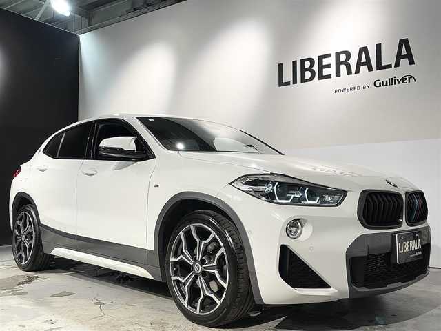 ＢＭＷ Ｘ２ xDrive 18d MスポーツX EDジョイ+ 道央・札幌 2020(令2)年 3.9万km アルピンホワイトⅢ コンフォートパッケージ/・オートマチックテールゲートオペレーション/・フロントシートヒーティング/アドバンスドアクティブセーフティパッケージ/・BMWヘッドアップディスプレイ/・ドライビングアシストプラス/・ACC/アクティブクルーズコントロール/電動フロントシート/ハーフレザーシート/スポーツシート(D/N)/パーキングアシスト/PDC/パークディスタンスコントロール/リアビューカメラ/ドライビングアシスト/・レーンディパーチャーウォーニング/・前車接近警告機能/衝突回避 被害軽減ブレーキ/MsportXエクステリアパッケージ/LEDヘッドライト/LEDフォグランプ/ライトパッケージ/・アンビエントライト/・フットウェルライト/コンフォートアクセス/レインセンサー/デュアルエキゾーストテールパイプ/MライトアロイホイールYスポークスタイリング19インチAW/Mスポーツレザーステアリングホイール/10.25インチワイドコントロールディスプレイ/ミラー一体型ETC/純正ドライブレコーダー